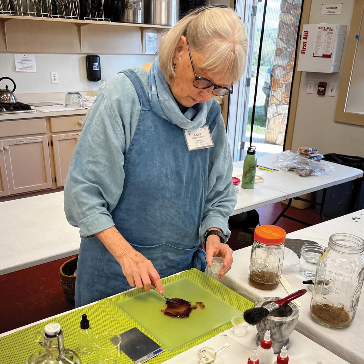 Sally preparing Cortinarius ominosus (Surprise Web-Cap) mushroom ink.